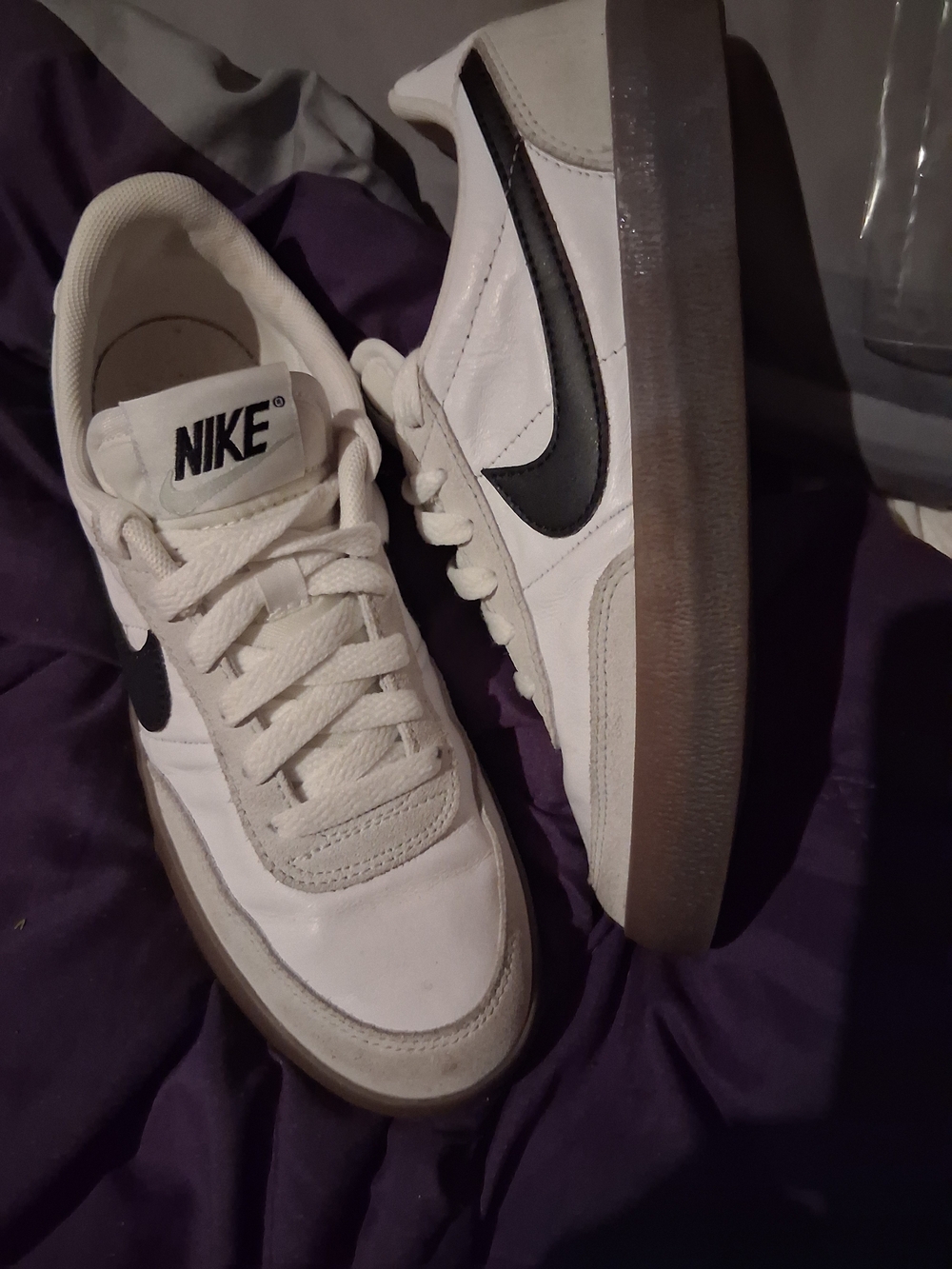 Nike White Sneakers with Black Swoosh